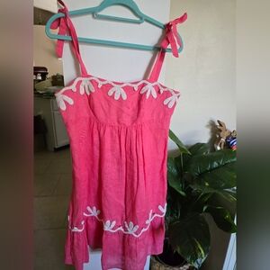 Pink Sundress with White Floral Accents